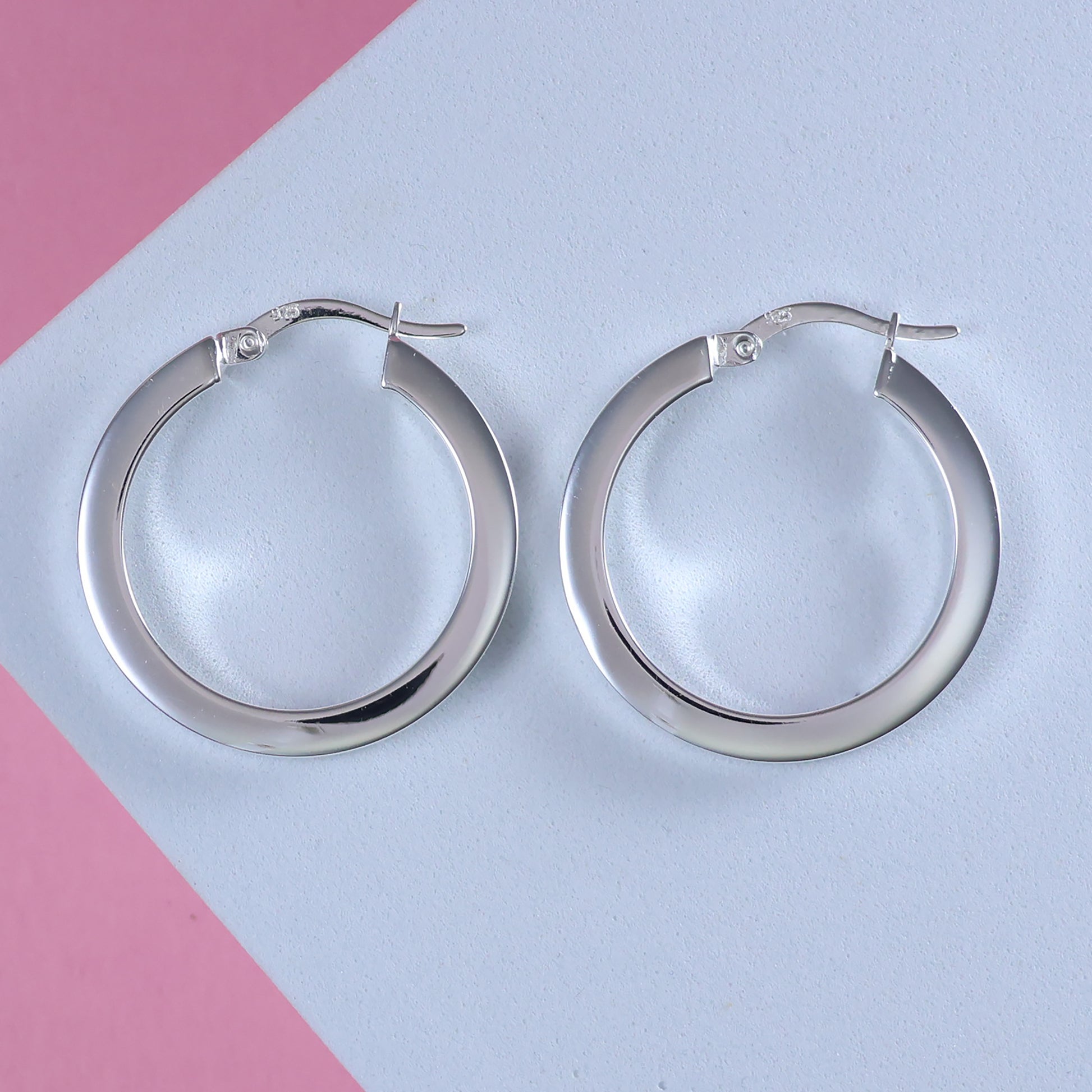 Sterling silver hoop earrings with a polished finish for elegant style